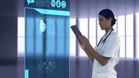 doctor looking at digitally generated medical icons on tablet