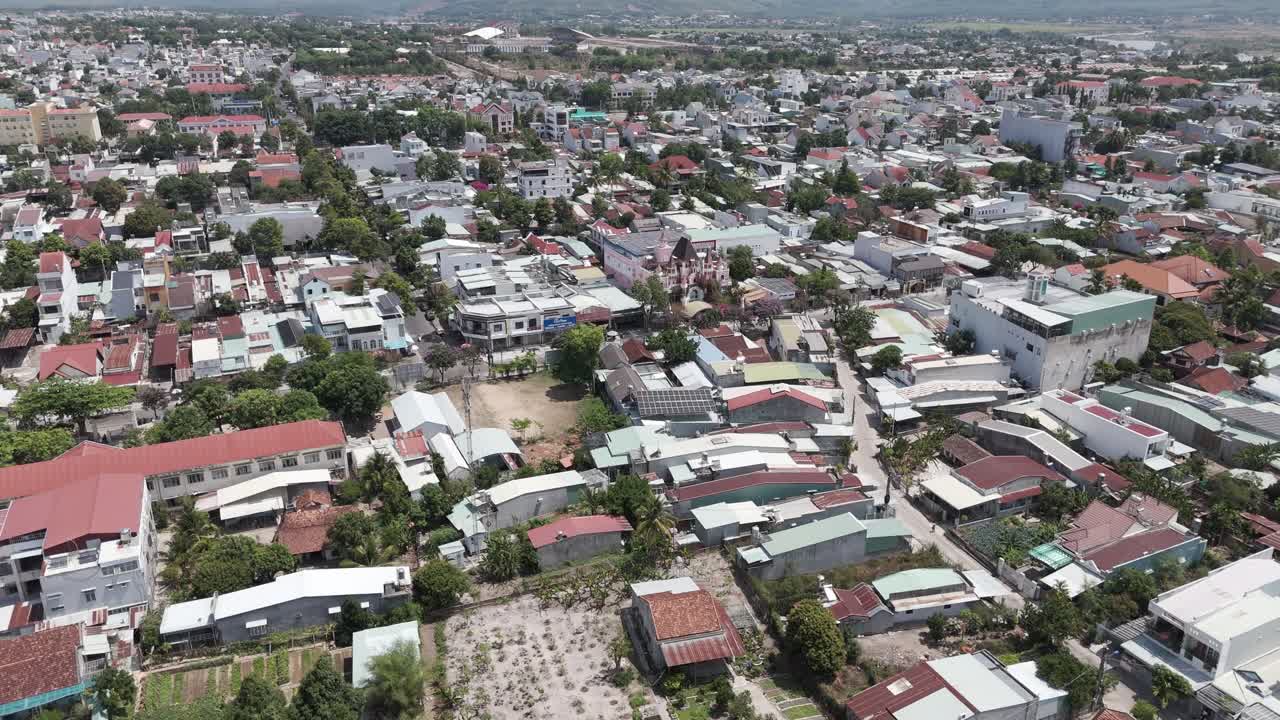 Descending drone footage above Kon Tum city, Vietnam