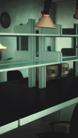 laboratory workspace with shelving and overhead lights