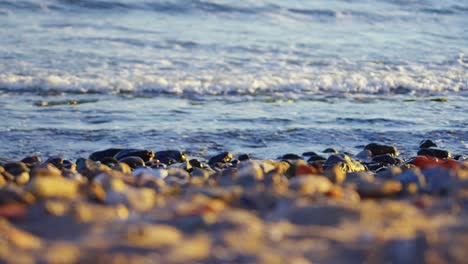 slow motion ocean waves at a rocky beach