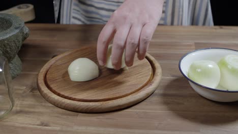 chef prepare onions for a delicious chimichurri sauce