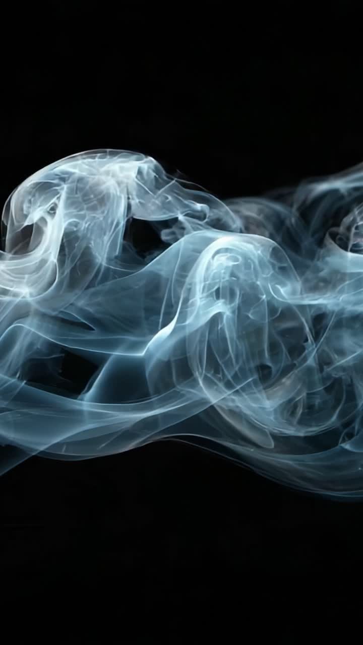 Affascinanti volute di fumo etereo che danzano su uno sfondo scuro, creando un'esperienza visiva intrigante che evoca mistero e calma