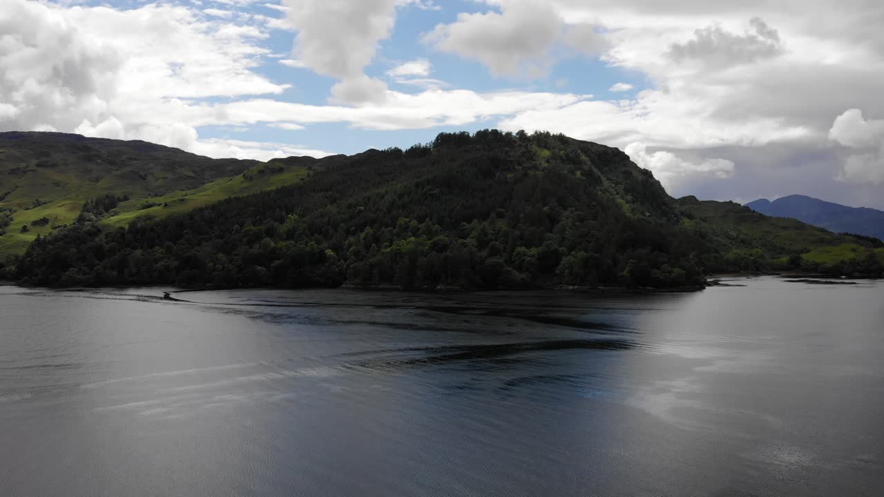 Drone footage forward ascending at Loch Duich, facing away from Eilean Donan Castle. Ungraded, June 2019