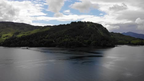 drone footage forward ascending at loch duich, facing away from eilean donan castle. ungraded, june 2019