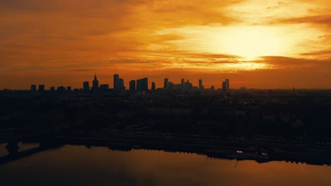 beautiful panoramic aerial drone skyline sunset view of the warsaw city centre with skyscrapers of the warsaw city and warsaw's old town with a market square and a mermaid statue, poland, eu