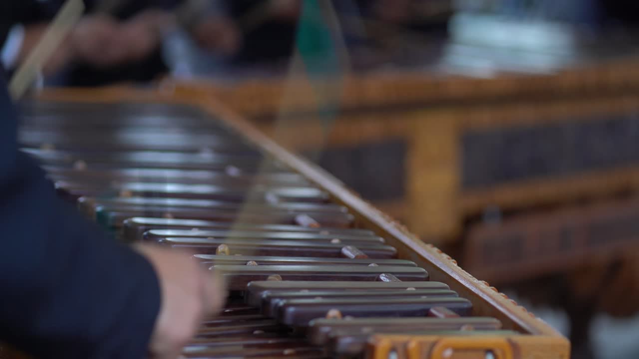 Musicians playing marimba. Close up of marimba players.