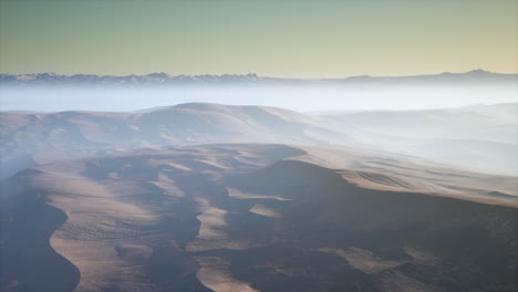 red sand desert dunes in fog