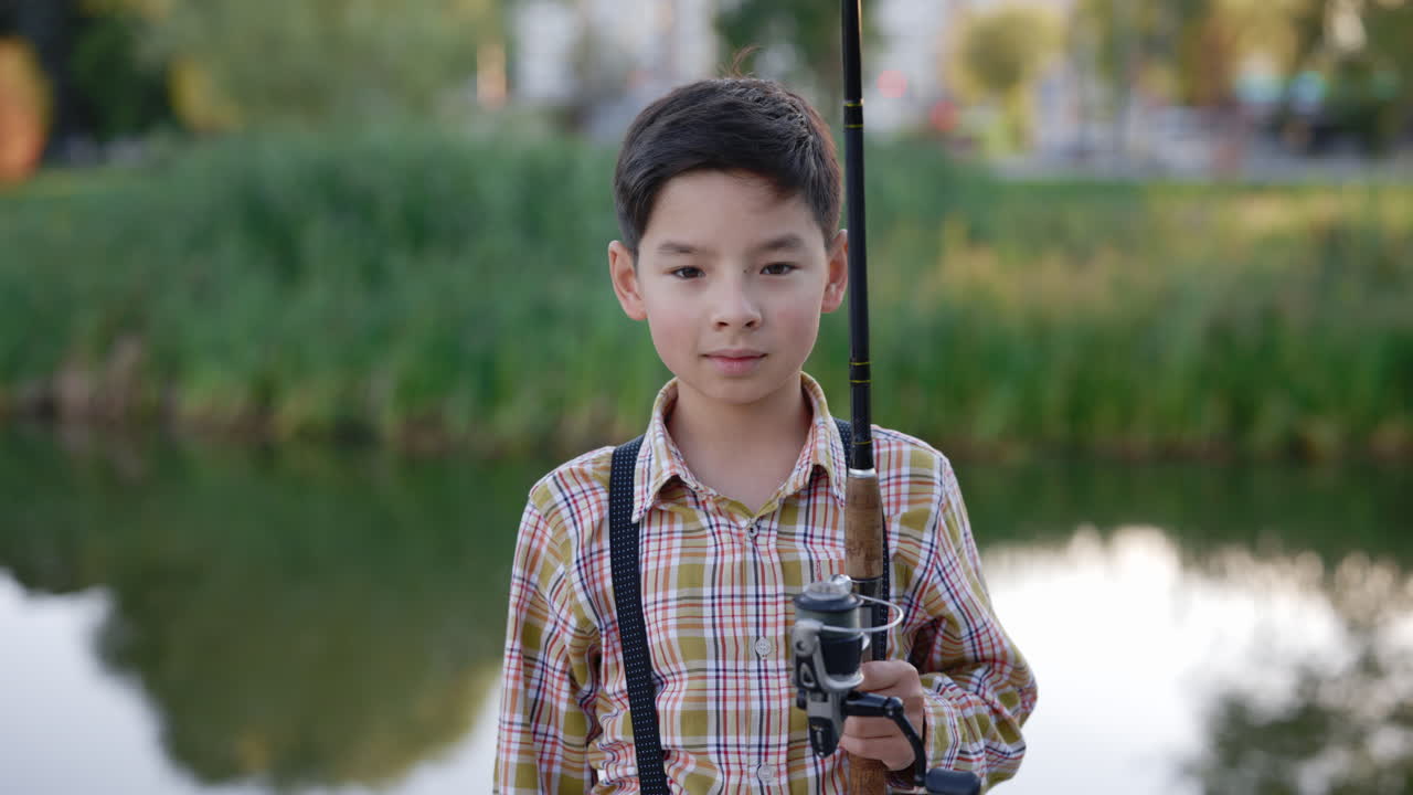 Young Boy Fishing in a Park