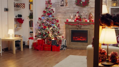 stylish room interior with christmas tree and gift boxes