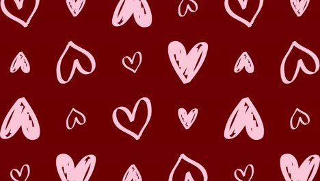 pink hearts pattern on burgundy background