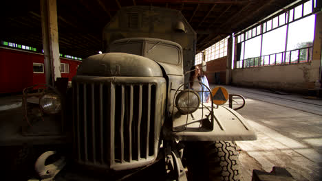vintage soviet truck in an industrial warehouse