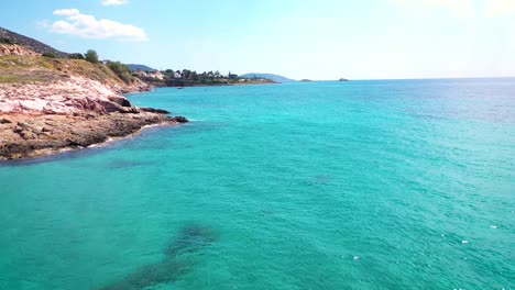 Amazing-turquoise-water-in-the-Agean-coast-of-Attica-Sunio-filmed-by-drone