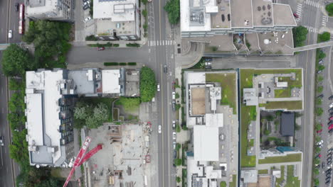 Overhead-aerial-shot-of-buildings-and-city-road