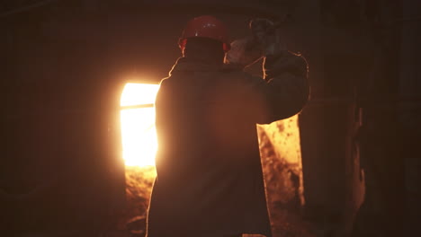 worker in a metal furnace