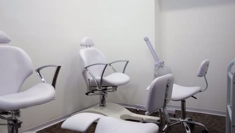 Beauty-center-white-pedicure-room-pan-Down