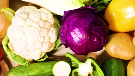 assorted vegetables arranged on a black background