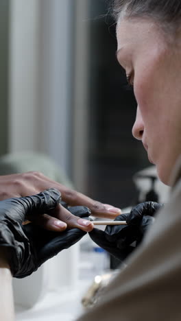 woman getting a manicure