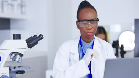 Black-woman,-scientist-thinking-with-laptop