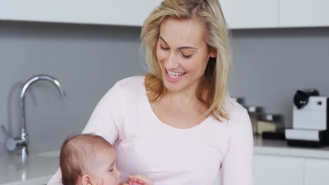 Mother-with-her-baby-using-laptop