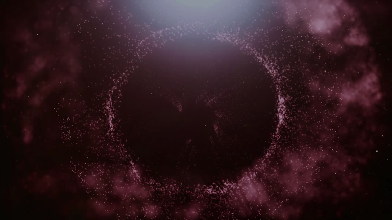partículas brillantes de color púrpura brillan y flotan en una corriente suave