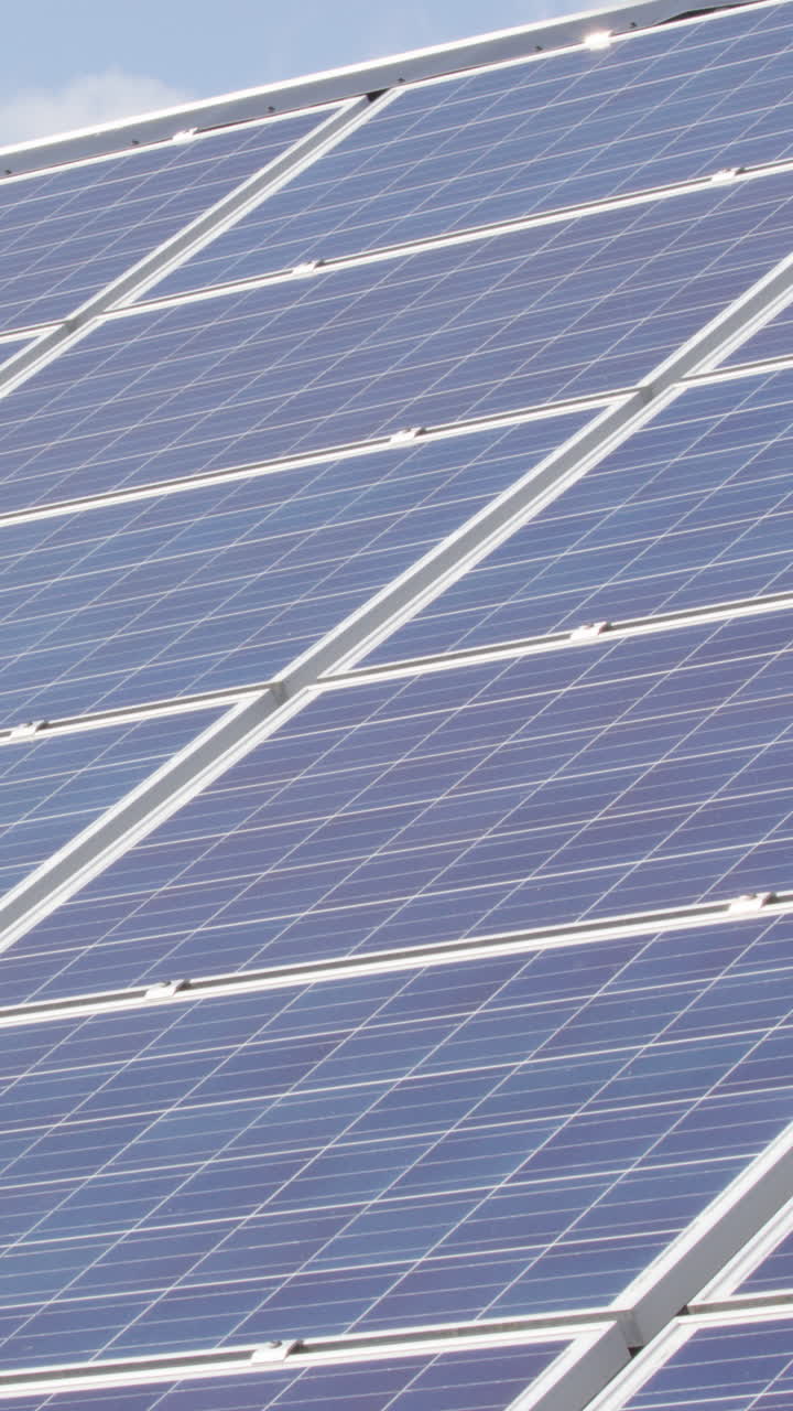 Slider of roof-mounted solar panels for renewable energy production, vertical