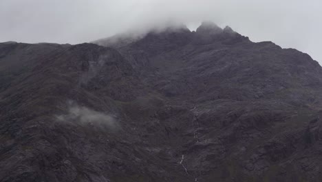 Moody-Misty-Scottish-Mountains-with-clouds-and-waterfall