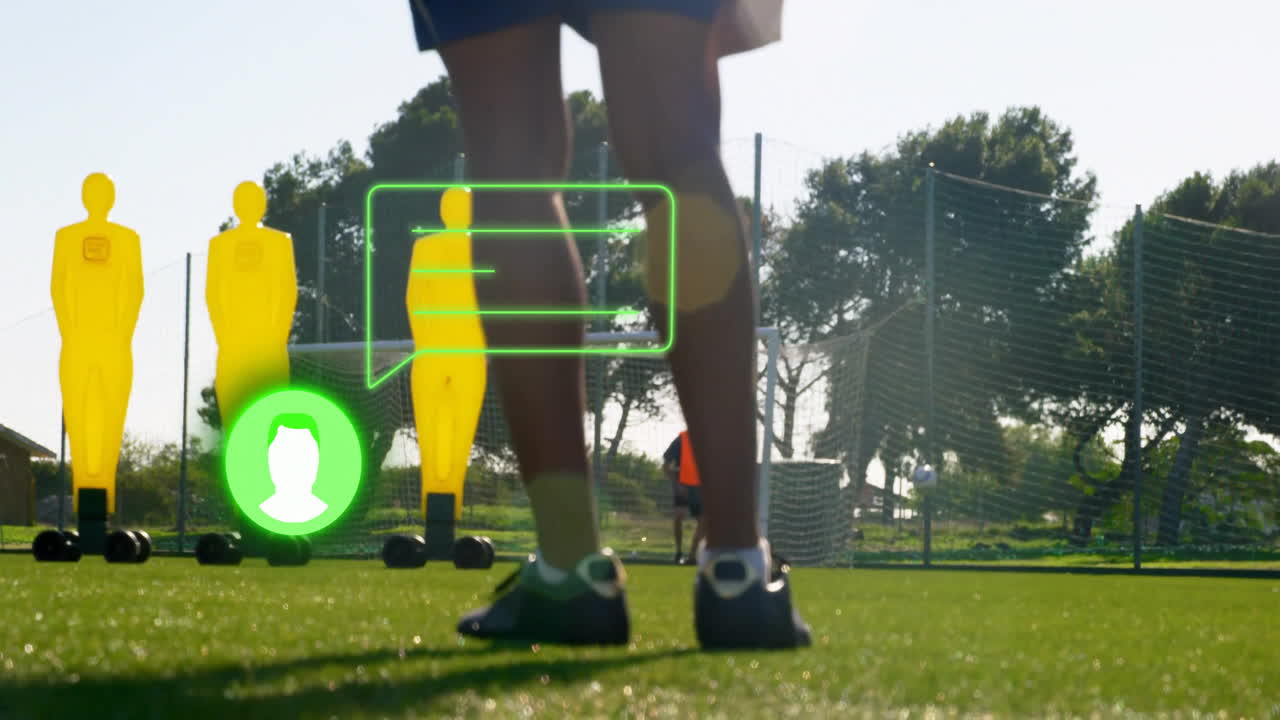 Practicing soccer on green field with animation icons and figures around player
