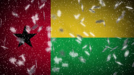 bandera de guinea bissau caída de nieve en bucle, año nuevo y fondo de navidad, bucle