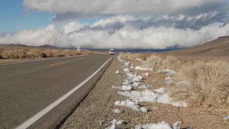 A-motor-home-passes-on-a-remote-desert-road