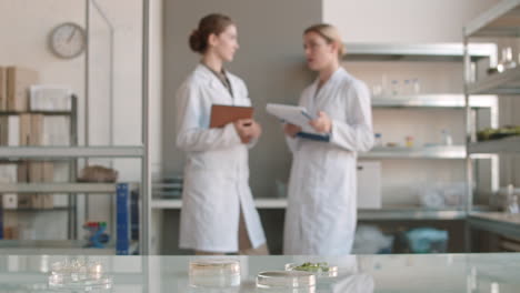 scientists discussing research in a laboratory