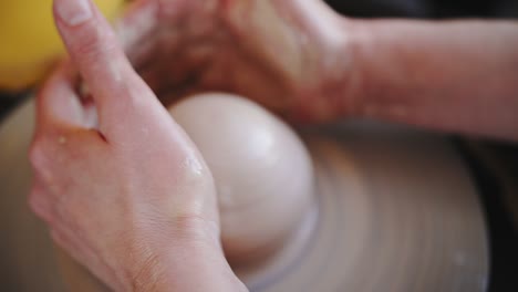 potter's wheel potter works with his hands