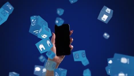 smartphone en la mano con iconos de desove