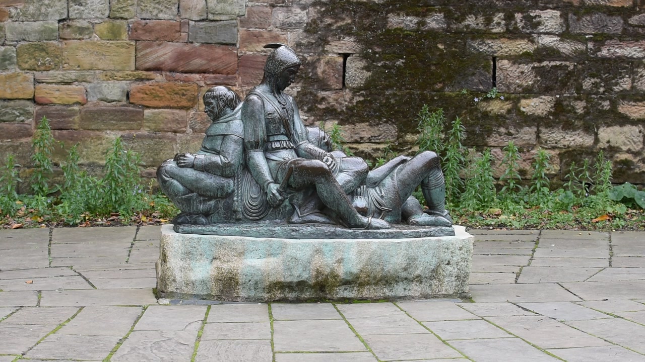 The Robin Hood statue stands proudly on Castle Road in Nottingham, England, aiming his arrow toward the historic gatehouse of Nottingham Castle.