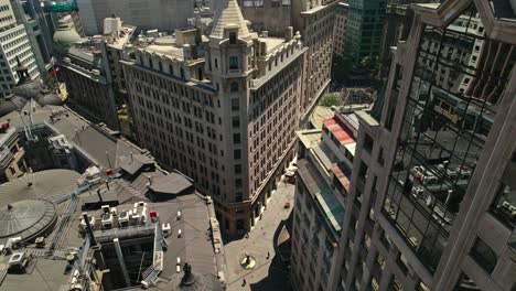 Aerial-Panoramic-Cityscape-of-Santiago-de-Chile-La-Bolsa-Business-Center-Zone,-Skyline-and-Streets,-Ariztía-Building