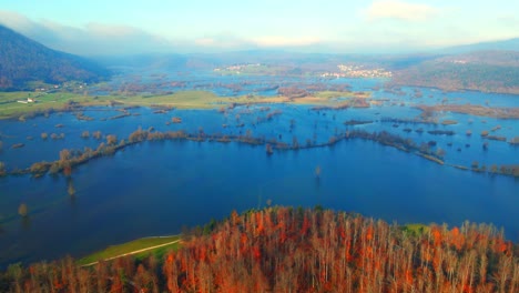 aerial 4k drone footage of a planina plain , slovenia