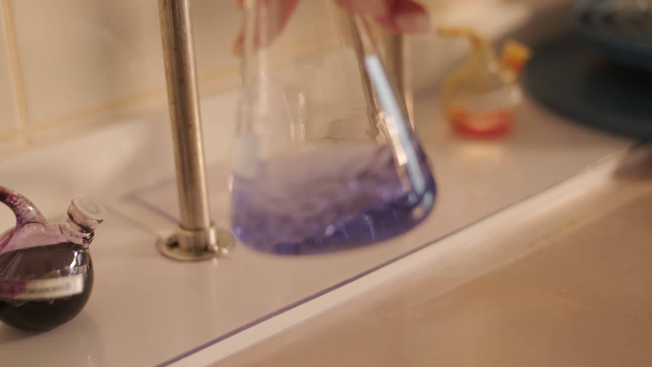 Lab experiment with a purple liquid