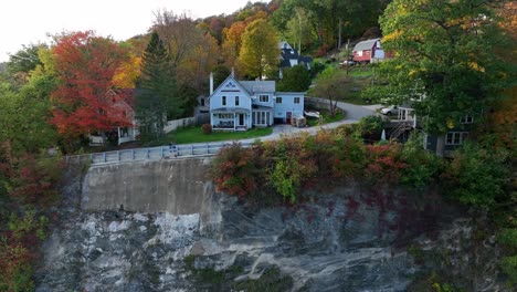 Cute-home-with-blue-siding-in-rural-mountains-of-New-England-USA