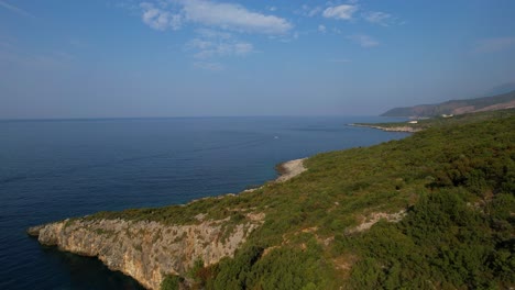 open sea horizon revealed behind stunning rocky shoreline of the ionian sea, breathtaking coastal beauty