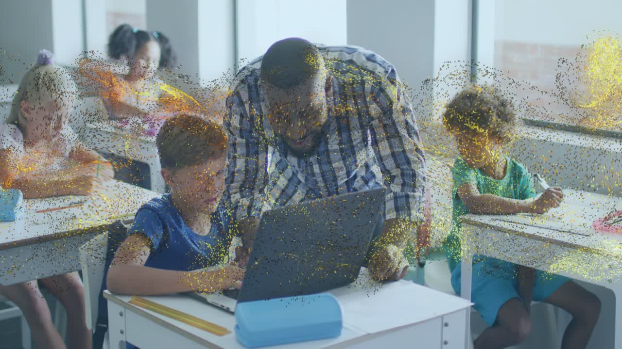 Teacher leaning over boy learning on laptop in class, particles coming left sweeping hiding fading