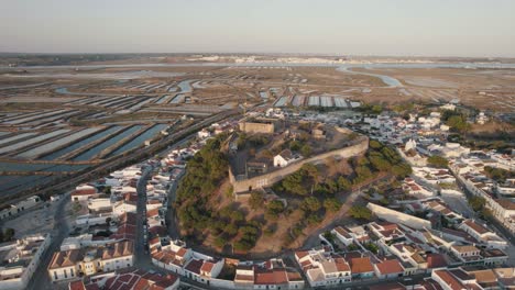 castro marim castle and geometrical field shapes created by salt pans