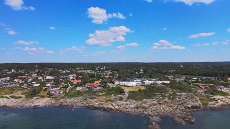 aerial view of coastal neighbourhood in asa, halland county, sweden - drone shot