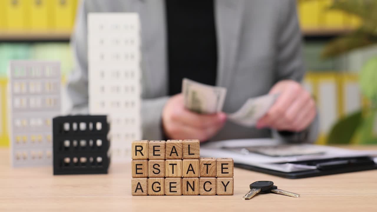 Real estate agency with money and keys