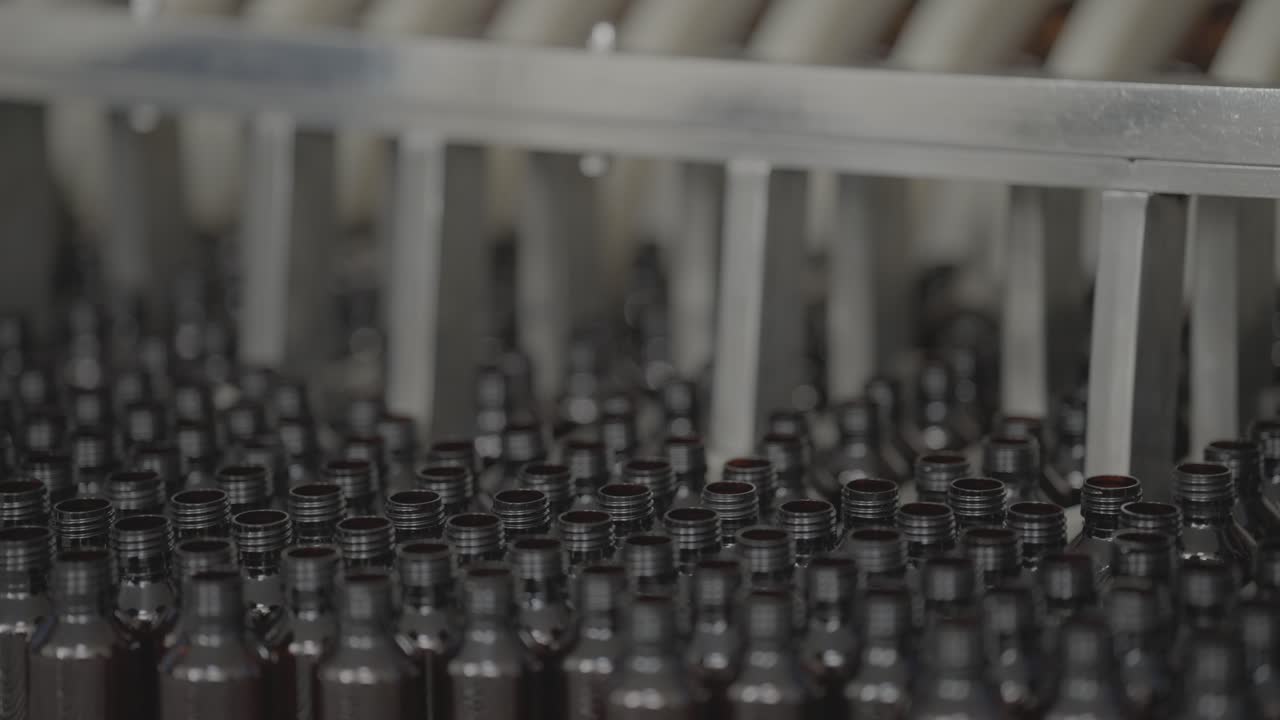 Syrup Bottles washing in machines.