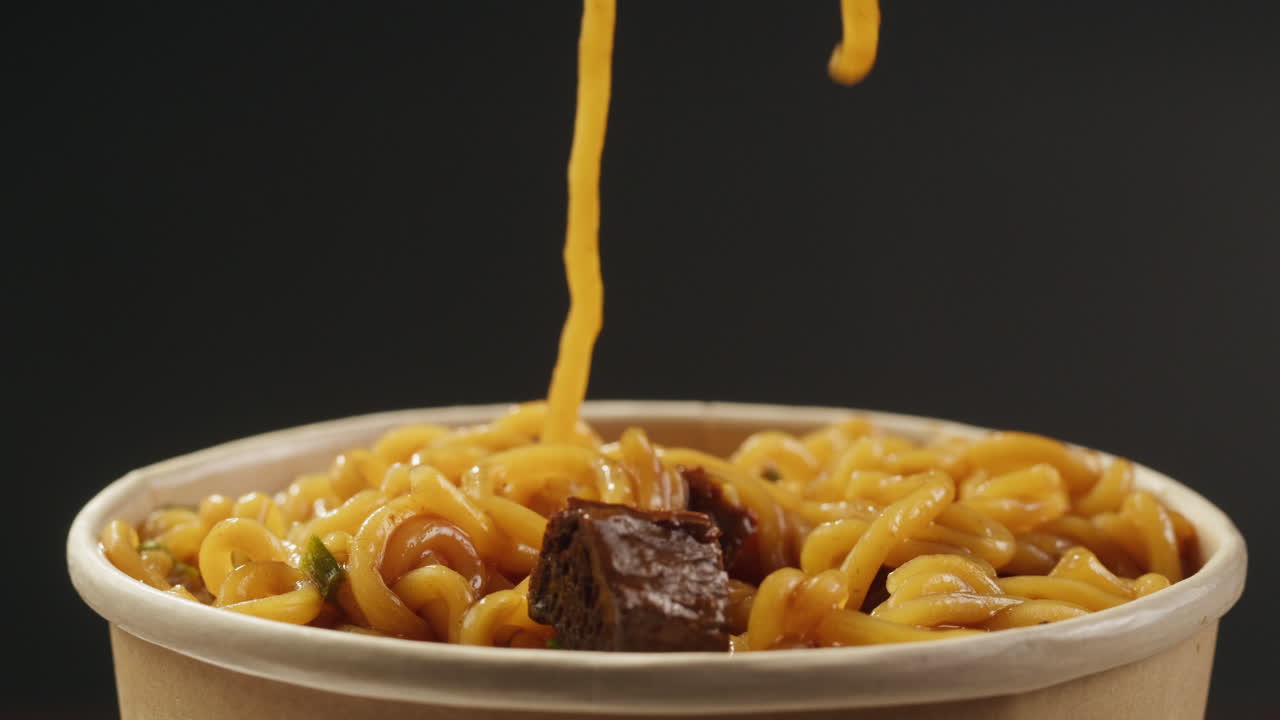 Closeup of Beef Ramen in a Disposable Cup