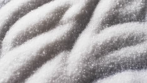 video of close up of white sand grains with pattern and copy space background