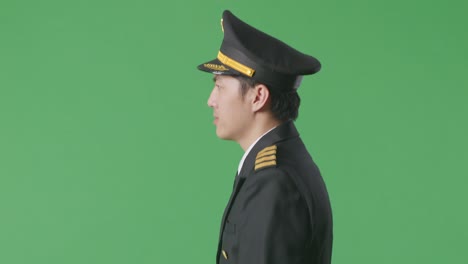 pilot in uniform on green screen