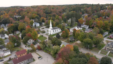 stunning orbiting aerial shot of the church in hallowell, maine