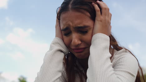 worried lady outdoors