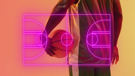 animation of pink court over midsection of african american male basketball player holding ball