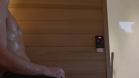 Sweating-Torso-Of-A-Man-Sitting-Inside-The-Sauna-Bath